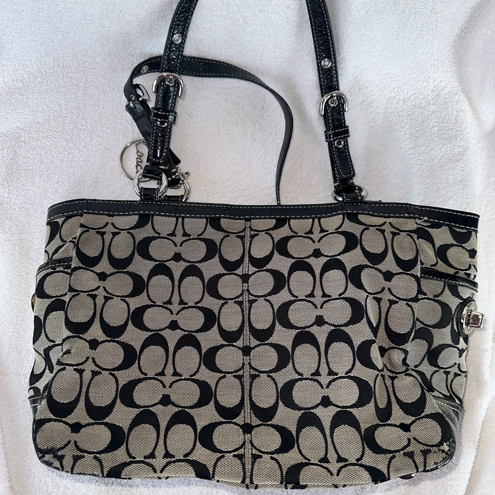 Signature coach purse